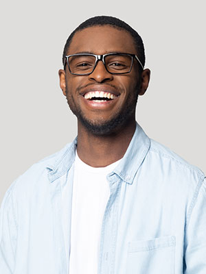 man smiling wearing glasses